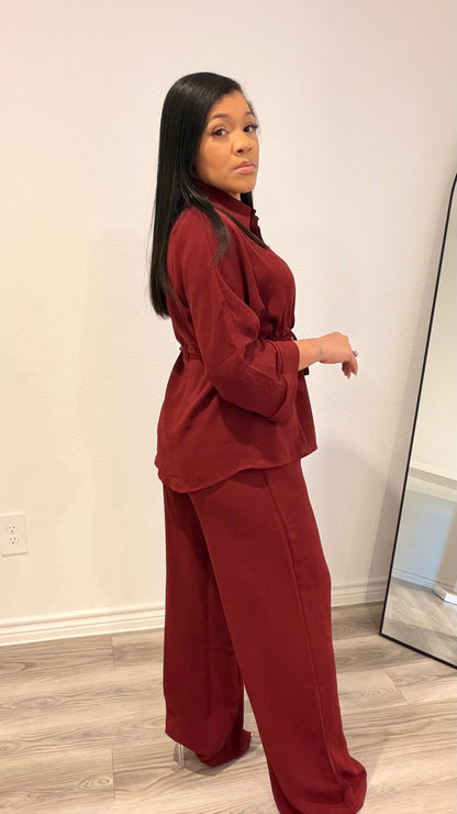 Woman wearing a relaxed drawstring two-piece set with a fluid silhouette.