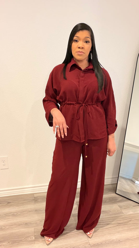 Woman wearing a relaxed drawstring two-piece set with a fluid silhouette.